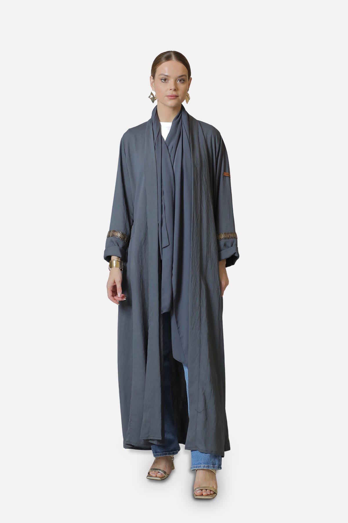 Full-length front view of the gray linen abaya with gold-tone sleeve accents.