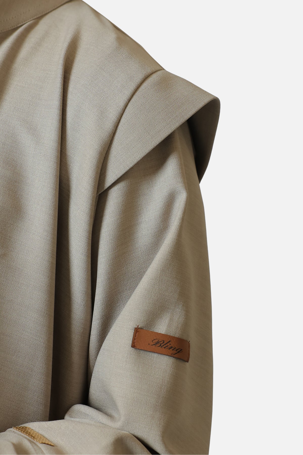 Beige cotton abaya — shoulder and sleeve detail