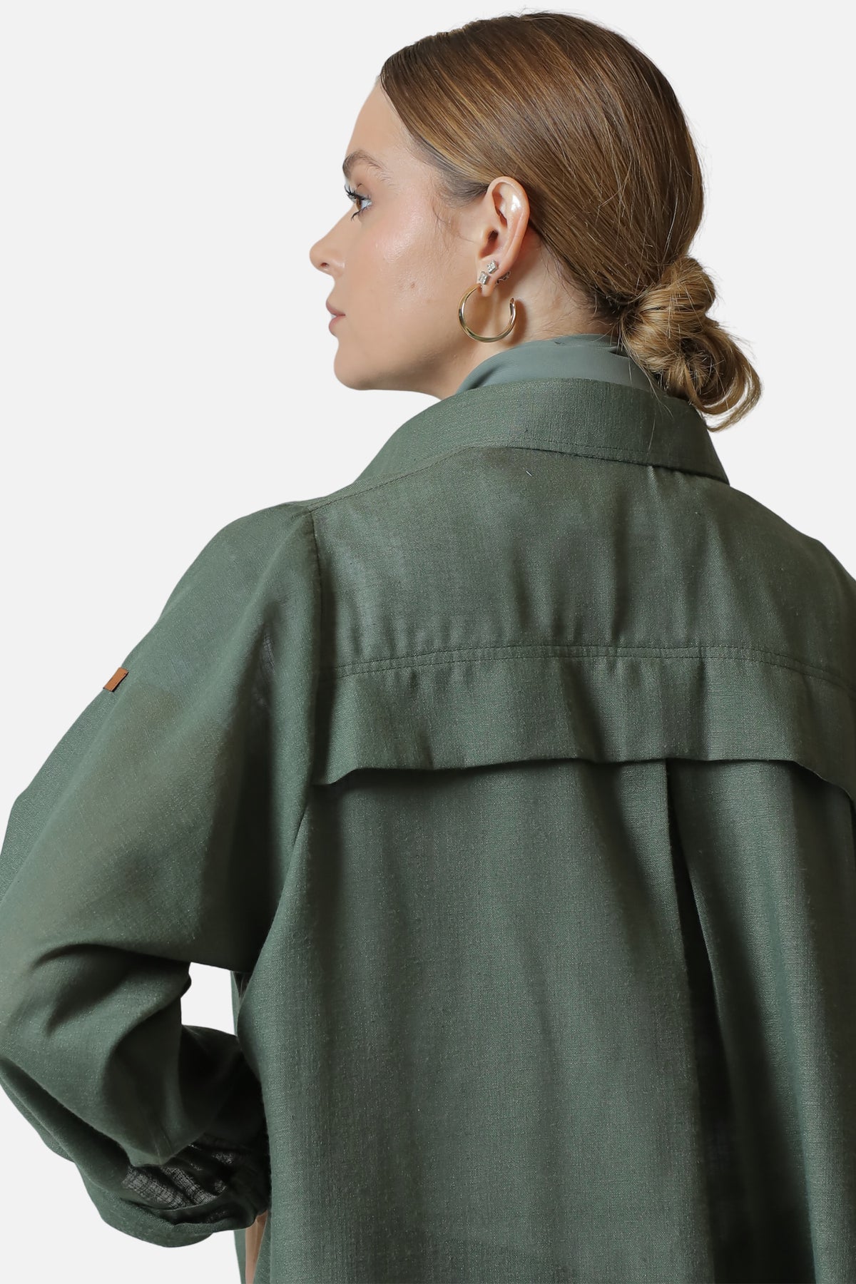 Green linen abaya — back view