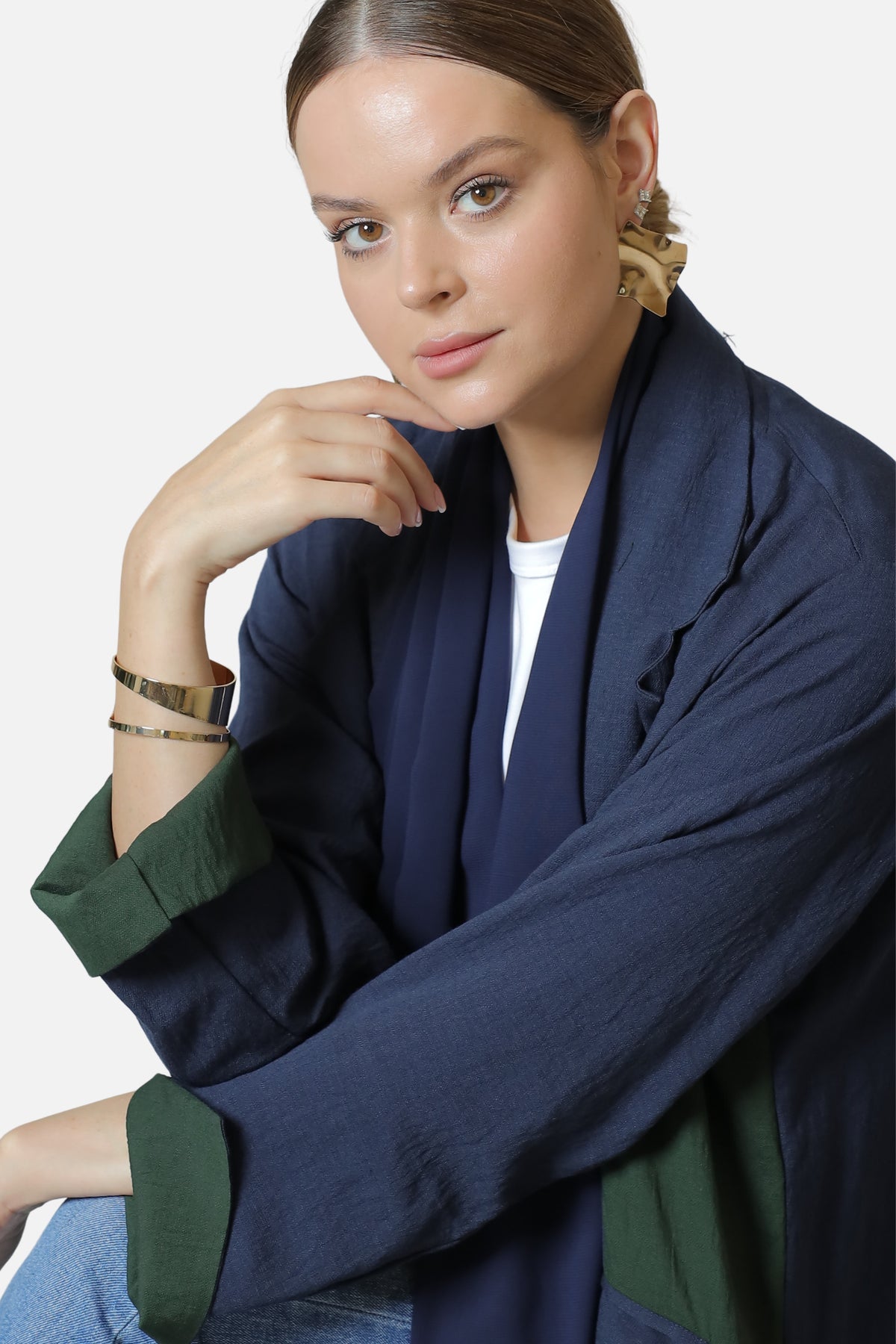 Blue and green linen abaya — styled detail view