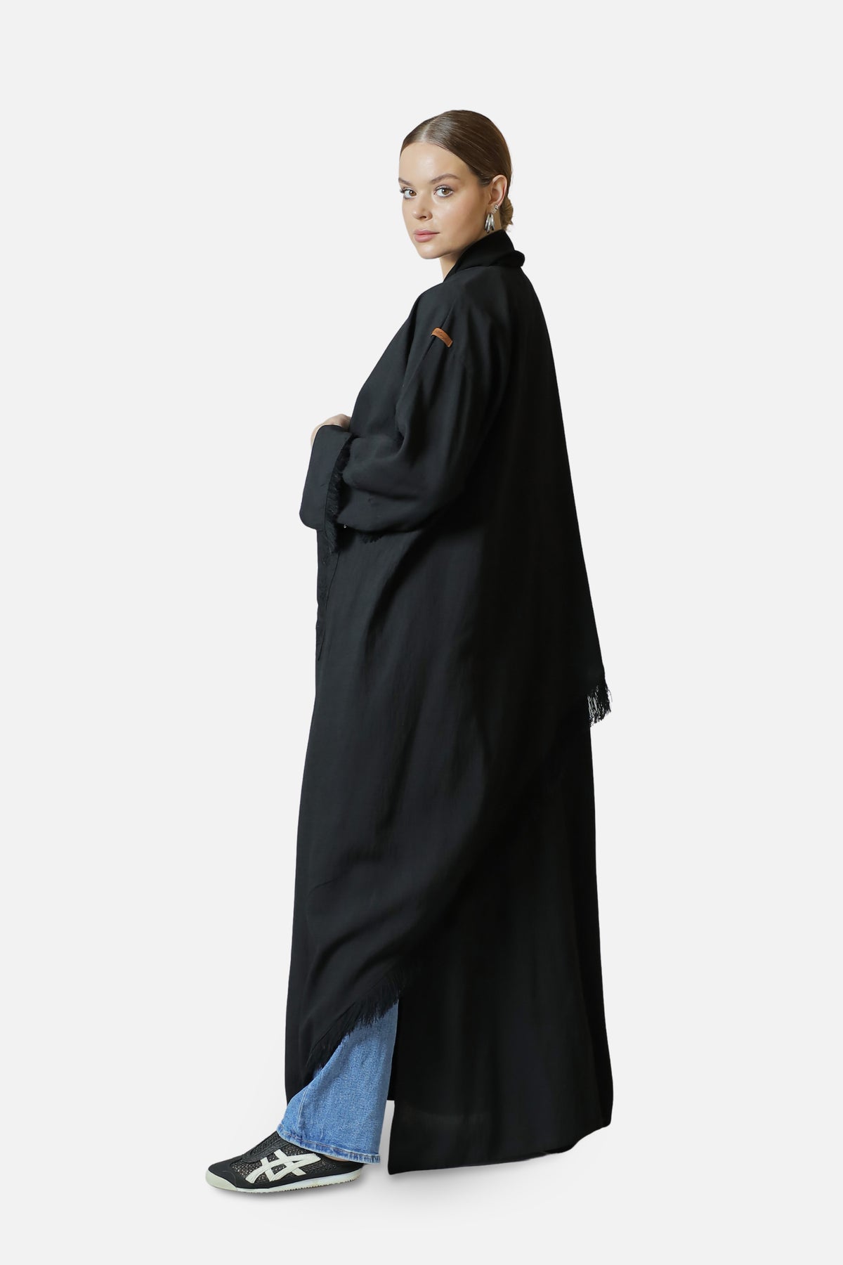 Black linen abaya, full-length side view showing the drape and length